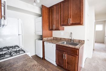 Renovated kitchen with washer and dryer